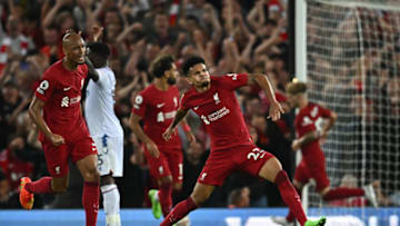 Liverpool's Colombian midfielder Luis Diaz (C) celebrates after scoring his team first goal during the English Premier League football match between Liverpool and Crystal Palace at Anfield stadium, in Liverpool, north west England on August 15, 2022. - - RESTRICTED TO EDITORIAL USE. No use with unauthorized audio, video, data, fixture lists, club/league logos or 'live' services. Online in-match use limited to 120 images. An additional 40 images may be used in extra time. No video emulation. Social media in-match use limited to 120 images. An additional 40 images may be used in extra time. No use in betting publications, games or single club/league/player publications. (Photo by Paul ELLIS / AFP) / RESTRICTED TO EDITORIAL USE. No use with unauthorized audio, video, data, fixture lists, club/league logos or 'live' services. Online in-match use limited to 120 images. An additional 40 images may be used in extra time. No video emulation. Social media in-match use limited to 120 images. An additional 40 images may be used in extra time. No use in betting publications, games or single club/league/player publications. / RESTRICTED TO EDITORIAL USE. No use with unauthorized audio, video, data, fixture lists, club/league logos or 'live' services. Online in-match use limited to 120 images. An additional 40 images may be used in extra time. No video emulation. Social media in-match use limited to 120 images. An additional 40 images may be used in extra time. No use in betting publications, games or single club/league/player publications. (Photo by PAUL ELLIS/AFP via Getty Images)