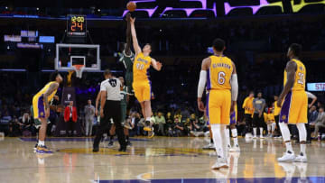 LOS ANGELES, CA - MARCH 17: Thon Maker #7 of the Milwaukee Bucks jumps for the ball against Ivica Zubac #40 of the Los Angeles Lakers at the start of the game on March 17, 2017 at STAPLES Center in Los Angeles, California. NOTE TO USER: User expressly acknowledges and agrees that, by downloading and or using this photograph, User is consenting to the terms and conditions of the Getty Images License Agreement. (Photo by Robert Laberge/Getty Images)