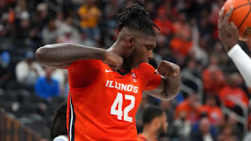 Nov 18, 2022; Las Vegas, Nevada, USA; Illinois Fighting Illini forward Dain Dainja (42) celebrates after making a play against the UCLA Bruins during the first half at T-Mobile Arena. Mandatory Credit: Stephen R. Sylvanie-USA TODAY Sports
