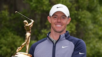 PONTE VEDRA BEACH, FLORIDA - MARCH 17: Rory McIlroy of Northern Ireland poses with the winner's trophy after winning The PLAYERS Championship on The Stadium Course at TPC Sawgrass on March 17, 2019 in Ponte Vedra Beach, Florida.(Photo by Richard Heathcote/Getty Images)