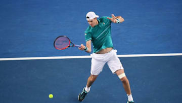 MELBOURNE, AUSTRALIA - JANUARY 15: John Isner of the United States plays a forehand in his first round match against Matthew Ebden of Australia on day one of the 2018 Australian Open at Melbourne Park on January 15, 2018 in Melbourne, Australia. (Photo by Quinn Rooney/Getty Images)