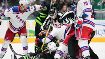 Oct 29, 2022; Dallas, Texas, USA; Dallas Stars left wing Jamie Benn (14) and New York Rangers center Vincent Trocheck (16) fight during the second period at American Airlines Center. Mandatory Credit: Chris Jones-USA TODAY Sports