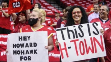 Apr 20, 2014; Houston, TX, USA; Houston Rockets fans hold signs before game one against the Portland Trail Blazers during the first round of the 2014 NBA Playoffs at Toyota Center. Mandatory Credit: Troy Taormina-USA TODAY Sports