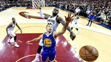 Jun 16, 2016; Cleveland, OH, USA; Cleveland Cavaliers forward LeBron James (23) blocks a shot by Golden State Warriors guard Stephen Curry (30) during the fourth quarter in game six of the NBA Finals at Quicken Loans Arena. Mandatory Credit: Bob Donnan-USA TODAY Sports