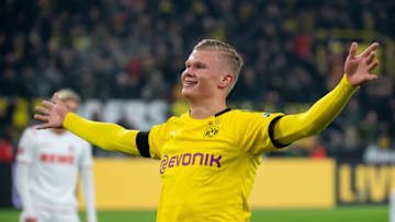 DORTMUND, GERMANY - JANUARY 24: (BILD ZEITUNG OUT) Erling Haaland of Borussia Dortmund celebrates after scoring his team's first goal during the Bundesliga match between Borussia Dortmund and 1. FC Koeln at Signal Iduna Park on January 24, 2020 in Dortmund, Germany. (Photo by TF-Images/Getty Images)