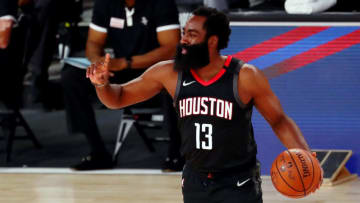 LAKE BUENA VISTA, FLORIDA - AUGUST 06: James Harden #13 of the Houston Rockets directs his team against the Los Angeles Lakers in the first half at The Arena at ESPN Wide World Of Sports Complex on August 6, 2020 in Lake Buena Vista, Florida. NOTE TO USER: User expressly acknowledges and agrees that, by downloading and or using this photograph, User is consenting to the terms and conditions of the Getty Images License Agreement. (Photo by Kim Klement-Pool/Getty Images)