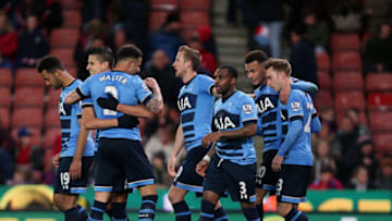 STOKE ON TRENT, ENGLAND - APRIL 18: Dele Alli of Tottenham Hotspur celebrates with his team-mates after scoring a goal to make it 0-4 during the Barclays Premier League match between Stoke City and Tottenham Hotspur at Britannia Stadium on April 18, 2016 in Stoke on Trent, England (Photo by James Baylis - AMA/Getty Images)