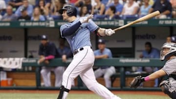 May 12, 2013; St. Petersburg, FL, USA; Tampa Bay Rays third baseman Evan Longoria (3) doubles during the sixth inning against the San Diego Padres at Tropicana Field. Tampa Bay Rays defeated the San Diego Padres 4-2. Mandatory Credit: Kim Klement-USA TODAY Sports