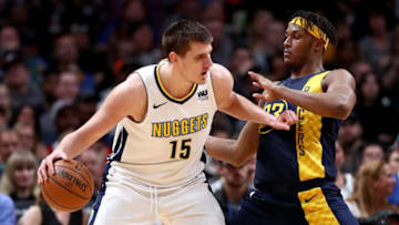 DENVER, CO - APRIL 03: Nikola Jokic #15 of the Denver Nuggets works towards the basket against Myles Turner #33 of th Indiana Pacers at the Pepsi Center on April 3, 2018 in Denver, Colorado. NOTE TO USER: User expressly acknowledges and agrees that, by downloading and or using this photograph, User is consenting to the terms and conditions of the Getty Images License Agreement. (Photo by Matthew Stockman/Getty Images)
