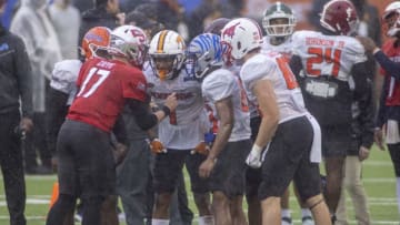 Feb 2, 2022; Mobile, AL, USA; American quarterback Bailey Zappe of Western Kentucky (17) sets the offense during American practice for the 2022 Senior Bowl in Mobile, AL, USA.Mandatory Credit: Vasha Hunt-USA TODAY Sports***Also pictured: American wide receiver Velus Jones Jr. of Tennessee (1), American wide receiver Calvin Austin III of Memphis (83) and American tight end Grant Calcaterra of SMU (80).