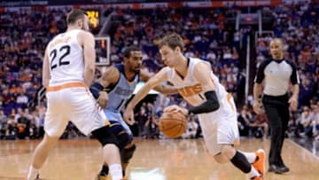 Apr 14, 2014; Phoenix, AZ, USA; Phoenix Suns guard Goran Dragic (1) dribbles against the Memphis Grizzlies during the first half at US Airways Center. Mandatory Credit: Joe Camporeale-USA TODAY Sports