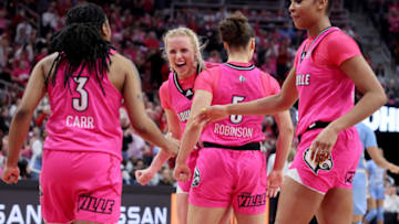 LOUISVILLE, KENTUCKY - FEBRUARY 05: Hailey Van Lith #10 of the Louisville Cardinals celebrates with teammates during the 62-55 win over the North Carolina Tar Heels at KFC YUM! Center on February 05, 2023 in Louisville, Kentucky. (Photo by Andy Lyons/Getty Images)
