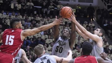 Jan 8, 2017; West Lafayette, IN, USA; Purdue Boilermakers forward Caleb Swanigan (50) and guard Dakota Mathias (31) go for a rebound withWisconsin Badgers forward Charles Thomas IV (15) in the first half at Mackey Arena. Mandatory Credit: Sandra Dukes-USA TODAY Sports