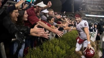 Nov 14, 2015; Waco, TX, USA; Oklahoma Sooners quarterback Baker Mayfield (6) celebrates with the Sooner fans after the win over the Baylor Bears at McLane Stadium. The Sooners defeat the Bears 44-34. Mandatory Credit: Jerome Miron-USA TODAY Sports