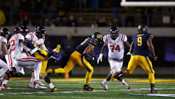 BERKELEY, CA - SEPTEMBER 16: Cameron Goode #19 of the California Golden Bears returns an interception for a touchdown against the Mississippi Rebels late in the fourth quarter at California Memorial Stadium on September 16, 2017 in Berkeley, California. (Photo by Ezra Shaw/Getty Images)