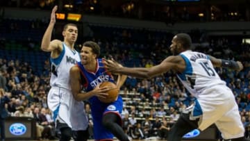 Dec 3, 2014; Minneapolis, MN, USA; Philadelphia 76ers guard Michael Carter-Williams (1) dribbles past Minnesota Timberwolves guard Zach LaVine (8) and forward Shabazz Muhammad (15) during the second quarter at Target Center. Mandatory Credit: Brace Hemmelgarn-USA TODAY Sports