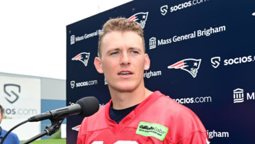 Jun 12, 2023; Foxborough, MA, USA; New England Patriots quarterback Mac Jones (10) speaks to the media at the Patriots minicamp at Gillette Stadium. Mandatory Credit: Eric Canha-USA TODAY Sports