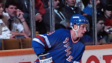 TORONTO, ON - MARCH 14: Darren Turcotte #8 of the New York Rangers skates against the Toronto Maple Leafs during NHL game action March 14, 1990 at Maple Leaf Gardens in Toronto, Ontario, Canada. New York defeated Toronto 8-2. (Photo by Graig Abel/Getty Images)