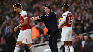 LONDON, ENGLAND - DECEMBER 22: Unai Emery, Manager of Arsenal talks with Sokratis Papastathopoulos during the Premier League match between Arsenal FC and Burnley FC at Emirates Stadium on December 22, 2018 in London, United Kingdom. (Photo by Shaun Botterill/Getty Images)
