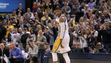 Mar 4, 2014; Indianapolis, IN, USA; Indiana Pacers forward Paul George (24) reacts to scoring late in the game against the Golden State Warriors at Bankers Life Fieldhouse. Golden State defeats Indiana 98-96. Mandatory Credit: Brian Spurlock-USA TODAY Sports