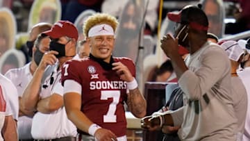 NORMAN, OK - SEPTEMBER 12: Oklahoma quarterback Spencer Rattler #7 smiles on the sidelines in the second half of an NCAA college football game against Missouri State on September 12, 2020, in Norman, Oklahoma. (Photo by Sue Ogrocki-Pool/Getty Images)