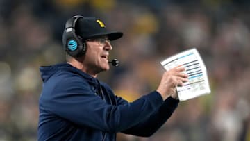 Dec 31, 2022; Glendale, Arizona, USA; Michigan Wolverines head coach Jim Harbaugh gestures from the sidelines against the TCU Horned Frogs in the second half of the 2022 Fiesta Bowl at State Farm Stadium. Mandatory Credit: Kirby Lee-USA TODAY Sports