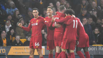 WOLVERHAMPTON, ENGLAND - JANUARY 23: Jordan Henderson of Liverpool celebrates with team-mates after scoring the opening goal during the Premier League match between Wolverhampton Wanderers and Liverpool FC at Molineux on January 23, 2020 in Wolverhampton, United Kingdom. (Photo by Michael Regan/Getty Images)
