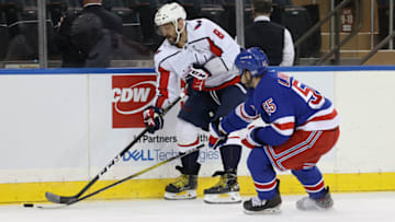NEW YORK, NEW YORK - MARCH 30: Alex Ovechkin #8 of the Washington Capitals skates against Ryan Lindgren #55 of the New York Rangers during their game at Madison Square Garden on March 30, 2021 in New York City. (Photo by Al Bello/Getty Images)