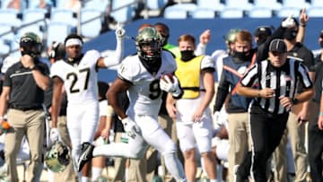 CHAPEL HILL, NC - NOVEMBER 14: Kenneth Walker III #9 of Wake Forest races up the sideline with the ball during a game between Wake Forest and North Carolina at Kenan Memorial Stadium on November 14, 2020 in Chapel Hill, North Carolina. (Photo by Andy Mead/ISI Photos/Getty Images)