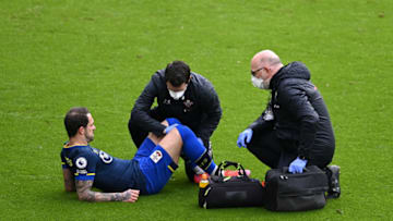 SHEFFIELD, ENGLAND - MARCH 06: Danny Ings of Southampton receives medical treatment during the Premier League match between Sheffield United and Southampton at Bramall Lane on March 06, 2021 in Sheffield, England. Sporting stadiums around the UK remain under strict restrictions due to the Coronavirus Pandemic as Government social distancing laws prohibit fans inside venues resulting in games being played behind closed doors. (Photo by Laurence Griffiths/Getty Images)