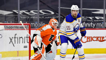 Mar 9, 2021; Philadelphia, Pennsylvania, USA; Buffalo Sabres defenseman Rasmus Ristolainen (55) in front of Philadelphia Flyers goaltender Brian Elliott (37) during the second period at Wells Fargo Center. Mandatory Credit: Eric Hartline-USA TODAY Sports