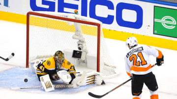 Aug 2, 2020; Toronto, Ontario, CANADA; Jaroslav Halak #41 of the Boston Bruins stops a shot by Scott Laughton #21 of the Philadelphia Flyers during a power play in the first period during Game One of the Eastern Conference Qualification Round prior to the 2020 NHL Stanley Cup Playoffs at Scotiabank Arena on August 02, 2020 in Toronto, Ontario., Canada. Mandatory Credit: Andre Ringuette via USA TODAY Sports