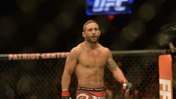 Apr 4, 2015; Fairfax, VA, USA; Chad Mendes (red gloves) celebrates after the first round of technical knock out against Richardo Lamas (not pictured) during UFC Fight Night at Patriot Center. Mandatory Credit: Tommy Gilligan-USA TODAY Sports