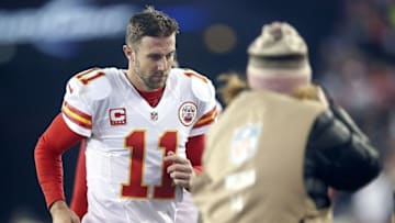 Jan 16, 2016; Foxborough, MA, USA; Kansas City Chiefs quarterback Alex Smith (11) walks off the field after loosing to the New England Patriots in the AFC Divisional round playoff game at Gillette Stadium. Mandatory Credit: Greg M. Cooper-USA TODAY Sports