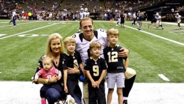 Aug 30, 2015; New Orleans, LA, USA; New Orleans Saints quarterback Drew Brees and his wife Brittany Brees pose for a photo with their children Baylen Robert Brees and Callen Christian Brees and Bowen Christopher Brees and Rylen Judith Brees (left) before a preseason game at the Mercedes-Benz Superdome. Mandatory Credit: Derick E. Hingle-USA TODAY Sports