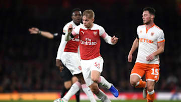 LONDON, ENGLAND - OCTOBER 31: Emile Smith-Rowe of Arsenal is challenged by Jordan Thompson of Blackpool during the Carabao Cup Fourth Round match between Arsenal and Blackpool at Emirates Stadium on October 31, 2018 in London, England. (Photo by Shaun Botterill/Getty Images)