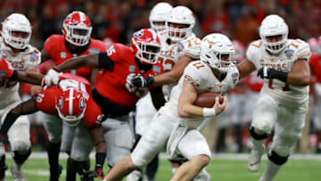 NEW ORLEANS, LOUISIANA - JANUARY 01: Sam Ehlinger #11 of the Texas Longhorns runs for a touchdown against the Georgia Bulldogs during the first half of the Allstate Sugar Bowl at the Mercedes-Benz Superdome on January 01, 2019 in New Orleans, Louisiana. (Photo by Sean Gardner/Getty Images)