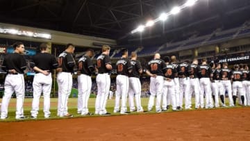 Sep 26, 2016; Miami, FL, USA; Miami Marlins players wear number 16 on their jerseys in honer of Marlins starting pitcher Jose Fernandez who passed away from a boating accident over the weekend prior to the game against the New York Mets at Marlins Park. Mandatory Credit: Steve Mitchell-USA TODAY Sports