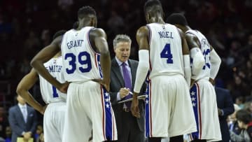 Apr 10, 2016; Philadelphia, PA, USA; Philadelphia 76ers head coach Brett Brown goes over a play with his team during the third quarter of the game against the Milwaukee Bucks at the Wells Fargo Center. The Milwaukee Bucks won 109-108 in OT. Mandatory Credit: John Geliebter-USA TODAY Sports