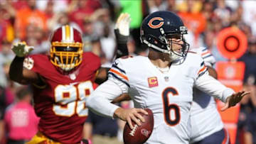 Oct 20, 2013; Landover, MD, USA; Chicago Bears quarterback Jay Cutler (6) prepares to throw the ball as Washington Redskins outside linebacker Brian Orakpo (98) chases in the second quarter at FedEx Field. The Redskins won 45-41. Mandatory Credit: Geoff Burke-USA TODAY Sports