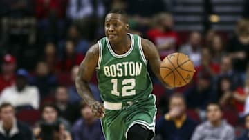 Dec 5, 2016; Houston, TX, USA; Boston Celtics guard Terry Rozier (12) brings the ball up the court during the second quarter against the Houston Rockets at Toyota Center. Mandatory Credit: Troy Taormina-USA TODAY Sports