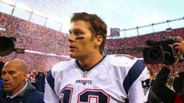 Jan 24, 2016; Denver, CO, USA; New England Patriots quarterback Tom Brady reacts as he leaves the field following the game against the Denver Broncos in the AFC Championship football game at Sports Authority Field at Mile High. The Broncos defeated the Patriots 20-18. Mandatory Credit: Mark J. Rebilas-USA TODAY Sports