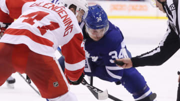 TORONTO, ON- DECEMBER 23 - Toronto Maple Leafs center Auston Matthews (34) faces-off against Detroit Red Wings center Luke Glendening (41) as the Toronto Maple Leafs beat the Detroit Red Wings 5-4 in overtime at Scotiabank Arena in Toronto. December 23, 2018. (Steve Russell/Toronto Star via Getty Images)