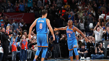Chris Paul #3 of the OKC Thunder and Danilo Gallinari #8 celebrate after a play during a game against the Philadelphia 76ers (Photo by Zach Beeker/NBAE via Getty Images)