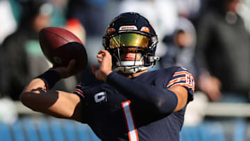 CHICAGO, ILLINOIS - DECEMBER 18: Justin Fields #1 of the Chicago Bears warms up prior to the game against the Philadelphia Eagles at Soldier Field on December 18, 2022 in Chicago, Illinois. (Photo by Michael Reaves/Getty Images)
