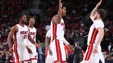 PORTLAND, OR - FEBRUARY 5: Hassan Whiteside #21 and Tyler Johnson #8 of the Miami Heat hi-five during the game against the Portland Trail Blazers on February 5, 2019 at the Moda Center Arena in Portland, Oregon. NOTE TO USER: User expressly acknowledges and agrees that, by downloading and or using this photograph, user is consenting to the terms and conditions of the Getty Images License Agreement. Mandatory Copyright Notice: Copyright 2019 NBAE (Photo by Sam Forencich/NBAE via Getty Images)