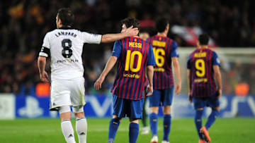 Frank Lampard of Chelsea consoles Lionel Messi of Barcelona. (Photo by Shaun Botterill/Getty Images)