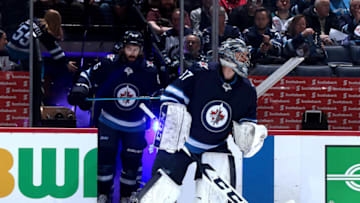 WINNIPEG, MB - FEBRUARY 18: Goaltender Connor Hellebuyck
