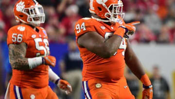 Dec 31, 2016; Glendale, AZ, USA; Clemson Tigers defensive tackle Carlos Watkins (94) reacts during the fourth quarter in the 2016 CFP semifinal against the Ohio State Buckeyes at University of Phoenix Stadium. Mandatory Credit: Matt Kartozian-USA TODAY Sports