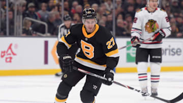 Dec 5, 2019; Boston, MA, USA; Boston Bruins defenseman John Moore (27) skates in the offensive zone against the Chicago Blackhawks during the first period at TD Garden. Mandatory Credit: Bob DeChiara-USA TODAY Sports